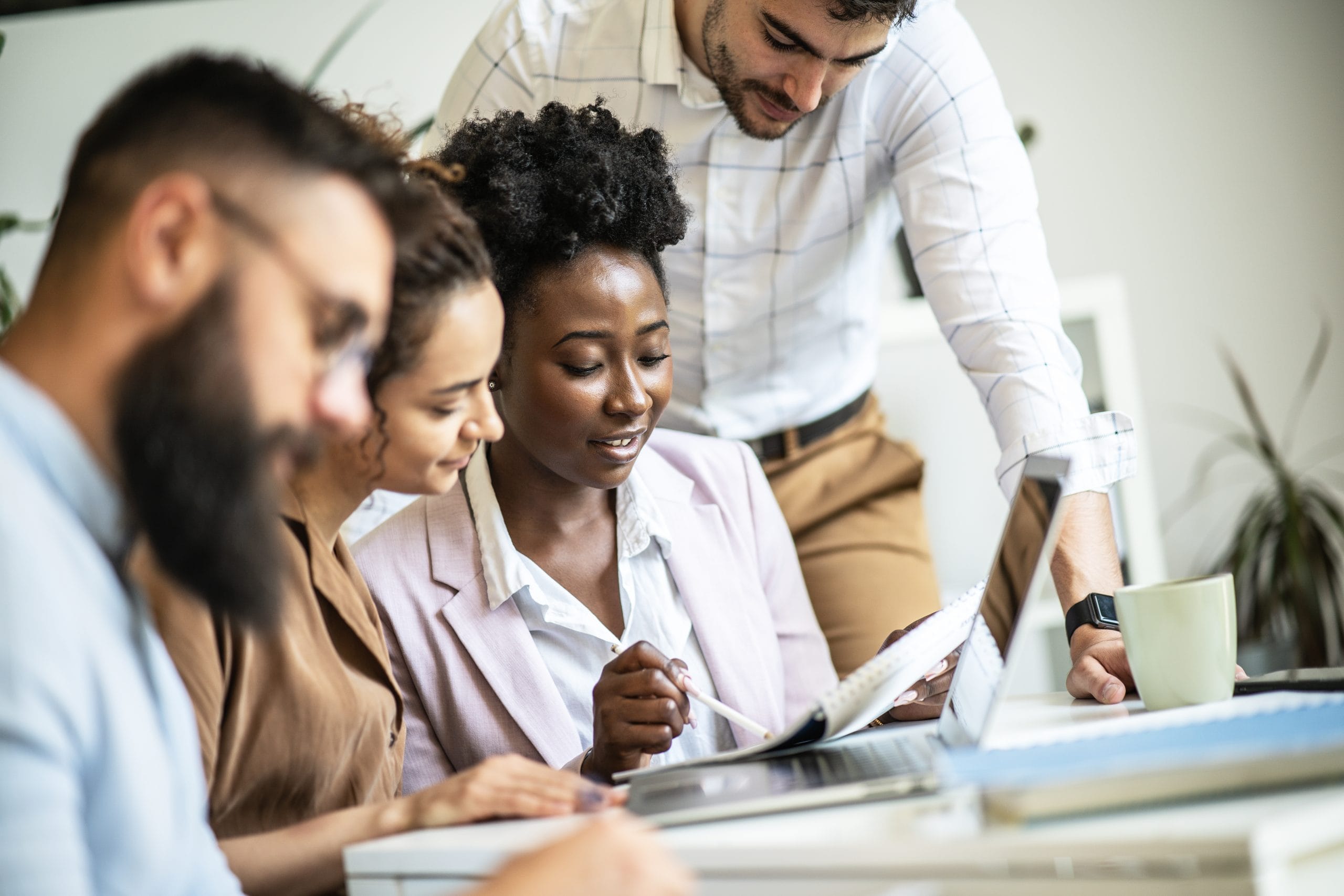 Team of employees review a dcoument